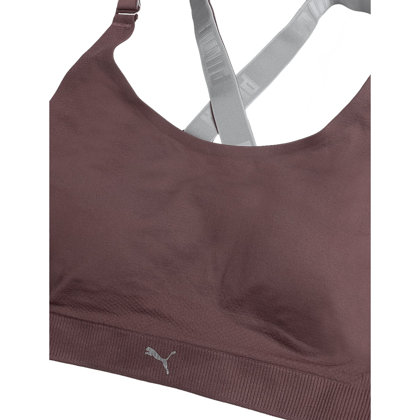 Détail du haut de sport 3D Knit femme PUMA 1P, mettant en avant la texture 3D Knit et les bonnets en