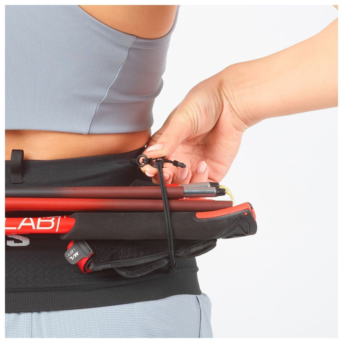 Gros plan de la ceinture Salomon ADV Skin Seamless 2071407 : coutures invisibles, fermeture éclair, 