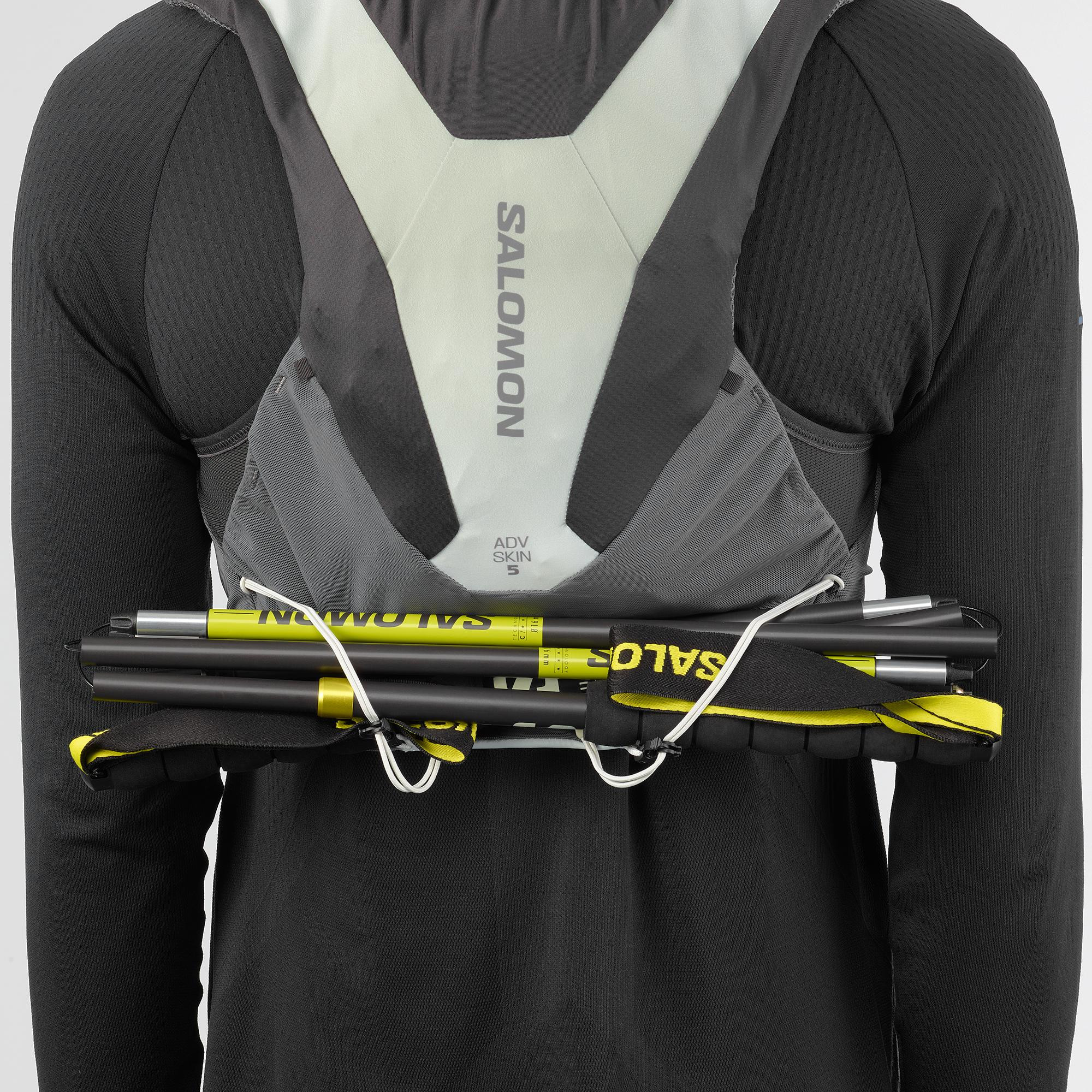 Detail of Salomon ADV Skin 5 Gradient Set front chest pocket and sternum strap