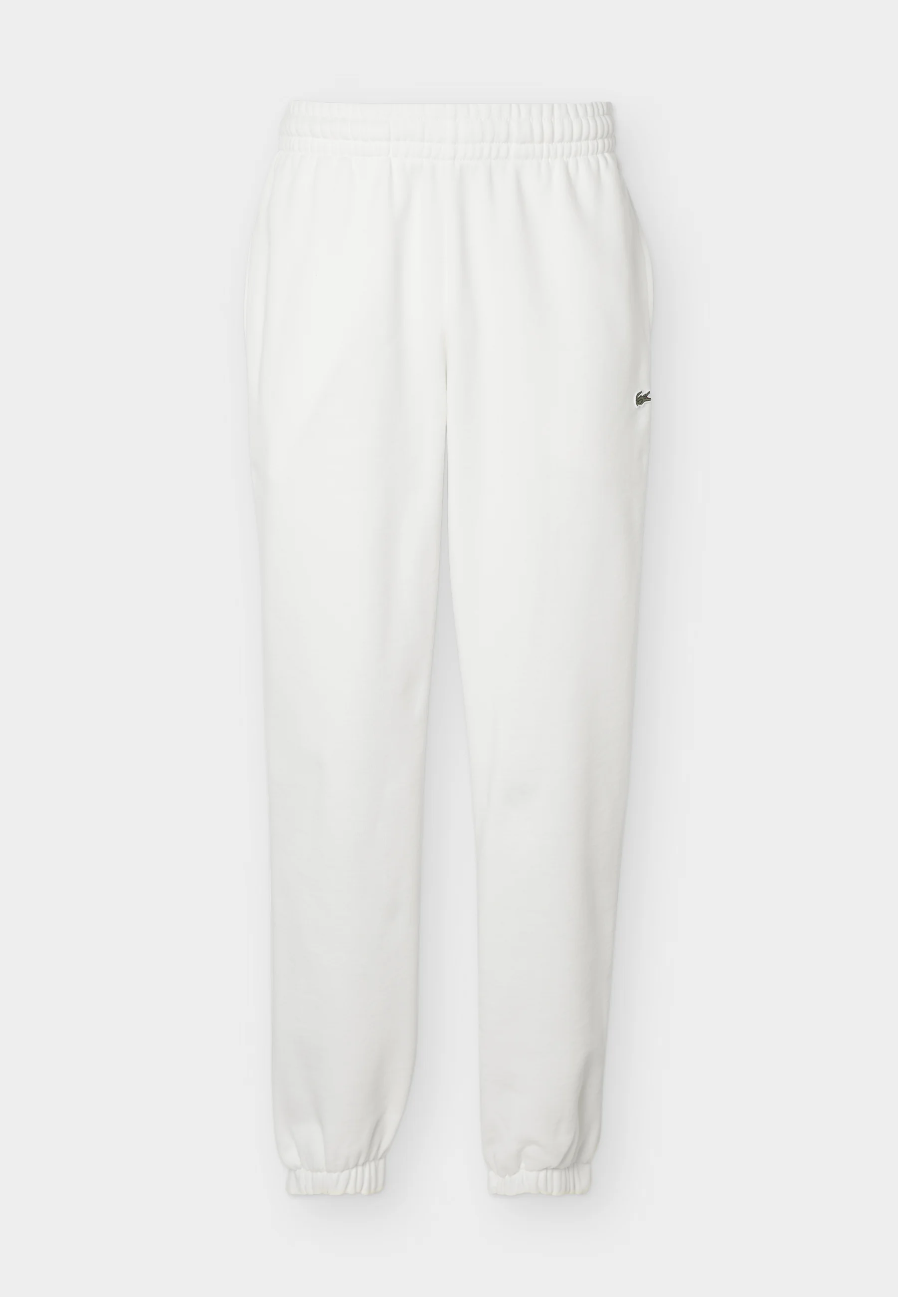 Pantalon Lacoste Core Performance : Confort et style pour le sport