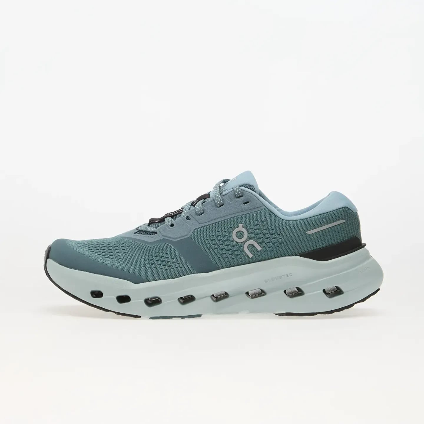 Vue de profil de la chaussure de running On Cloudrunner 3 en bleu canard avec semelle intermédiaire 