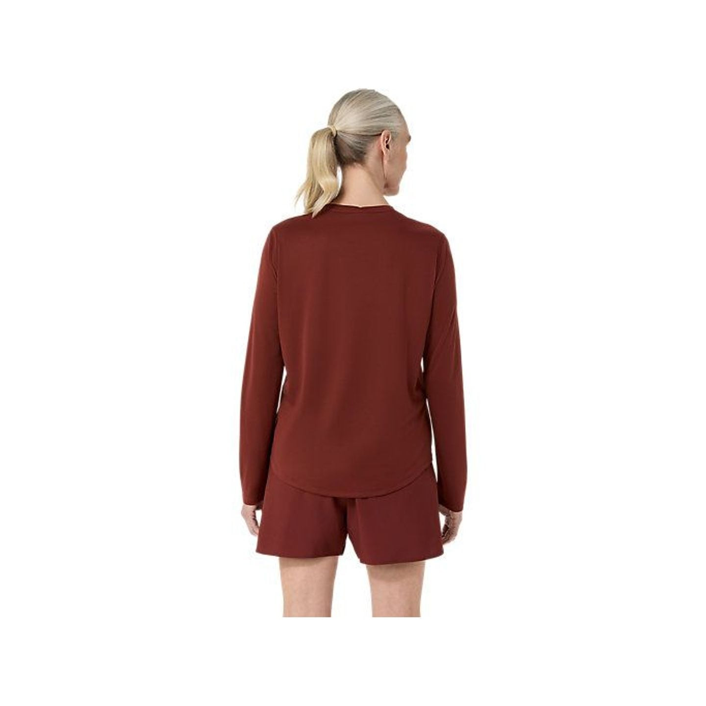 Femme courant en extérieur avec Asics Haut À Manches Longues De Running Core Ls Top Séchage Rapide F