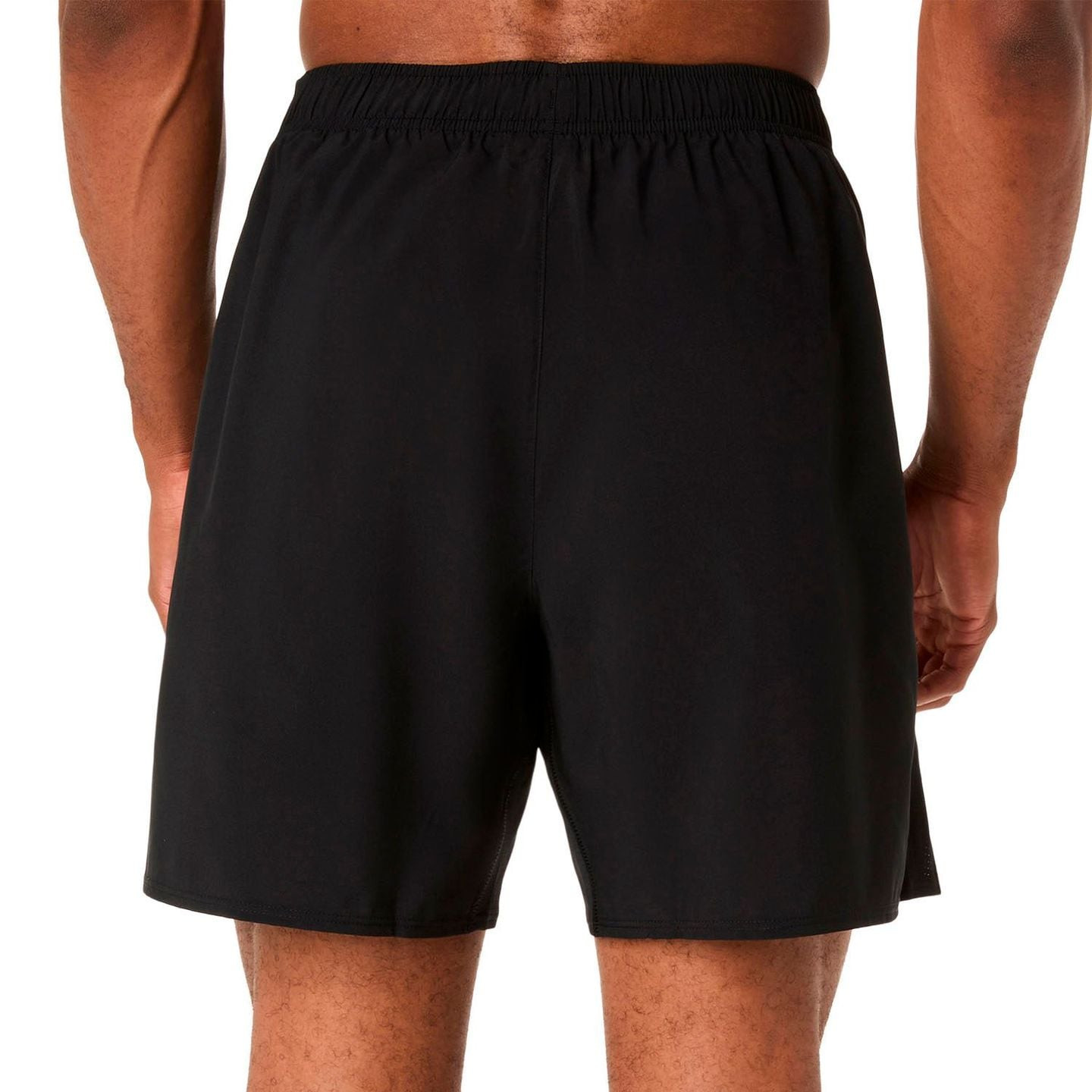 Vue arrière du short de running noir ASICS ICON 7IN, taille élastique et fente au bas