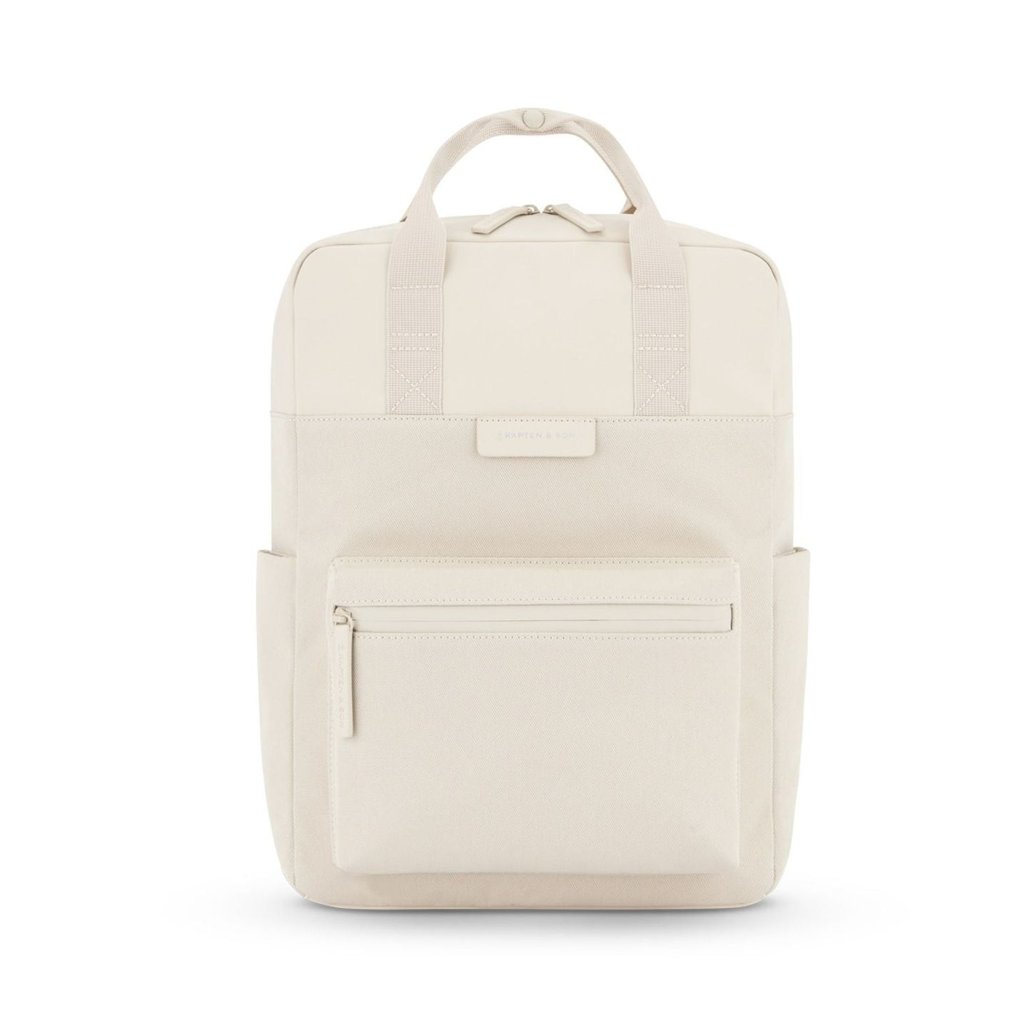 Vue de face du sac à dos Kapten & Son Bergen Pro Sandstone crème, montrant la poche zippée avant et 