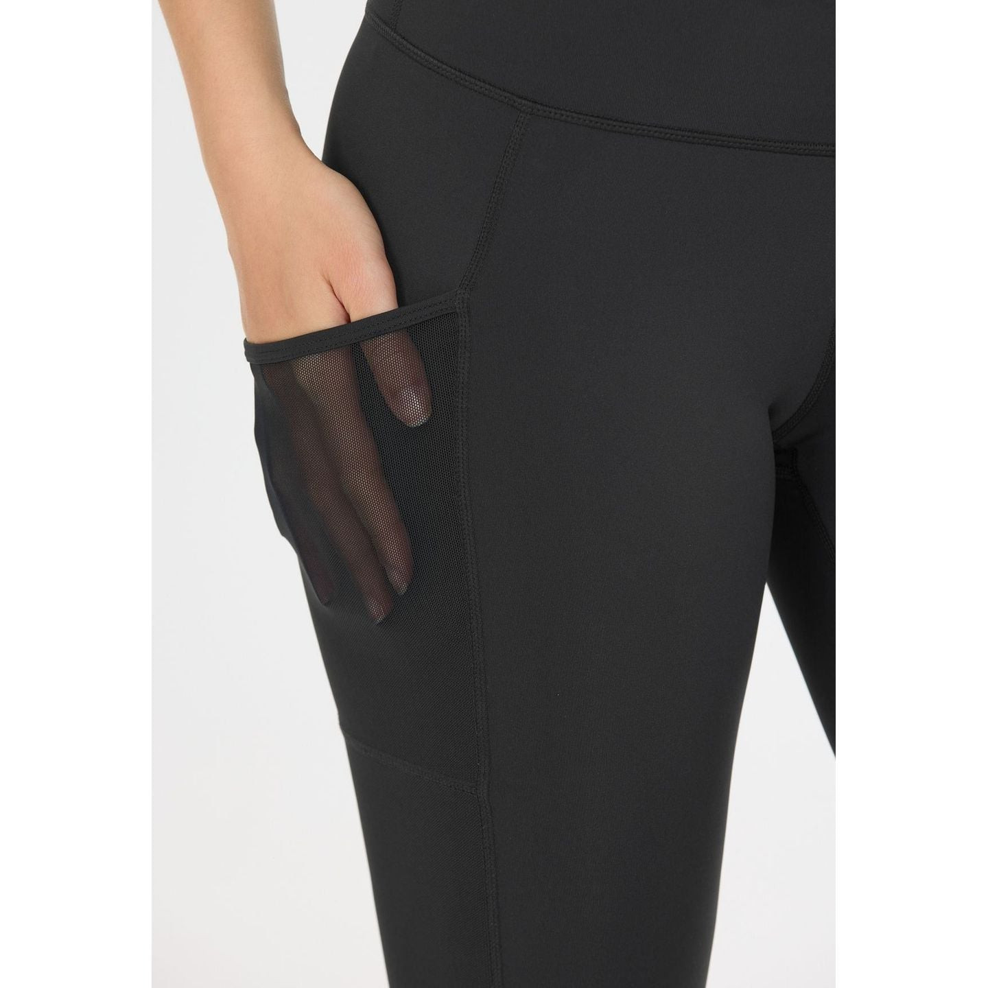 Vue détail : Athlecia Collant De Sport Ajusté Emissy Long Taille Mi-Haute Femme, coutures plates.