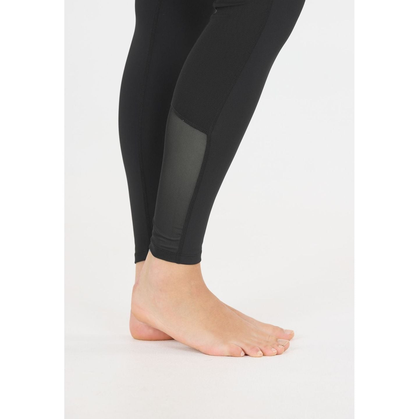 Détail : Athlecia Collant De Sport Ajusté Emissy Long Taille Mi-Haute Femme, tissu technique