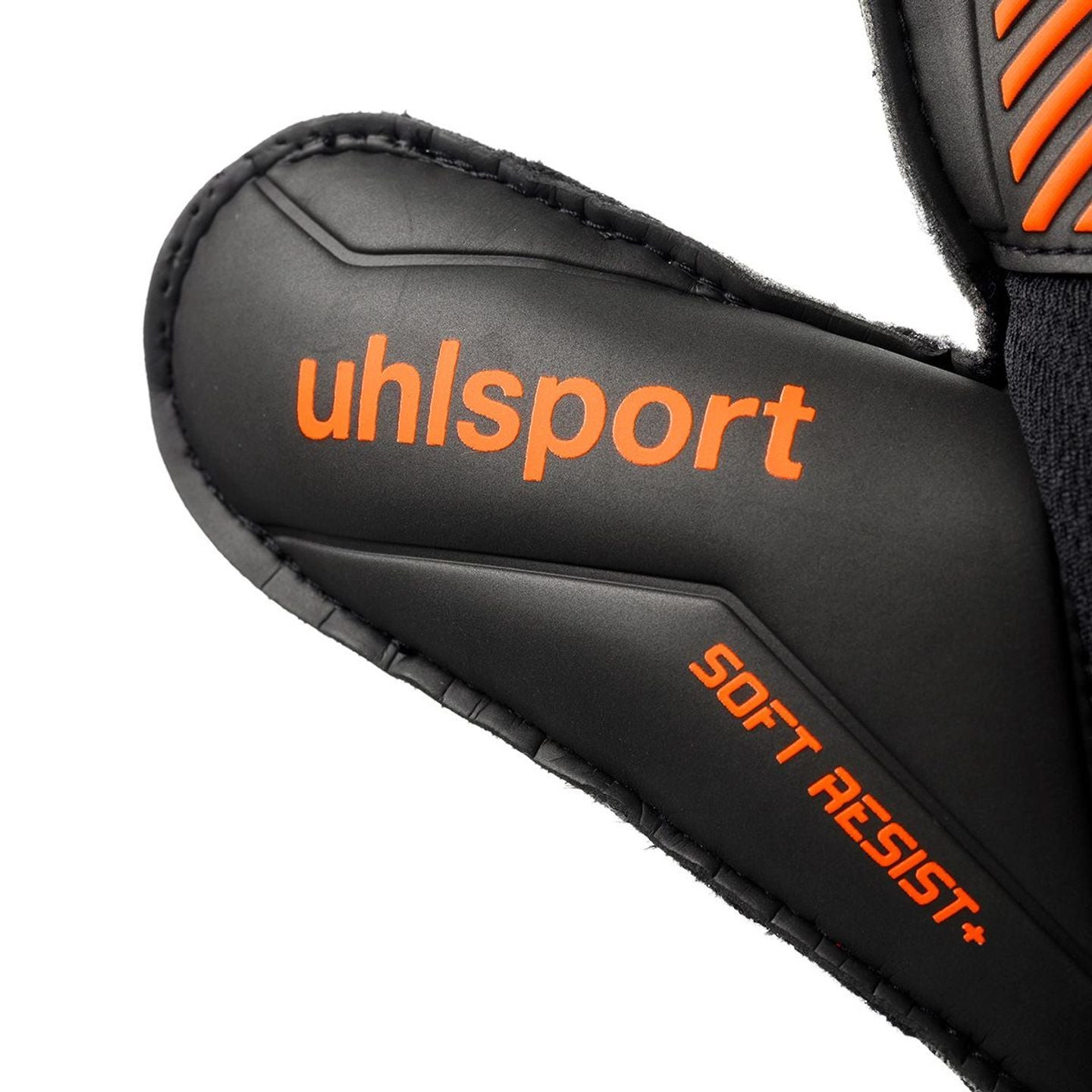 Détail gants gardien Uhlsport Fangmaschine Soft Resist+ gazon synthétique, mousse latex résistante.