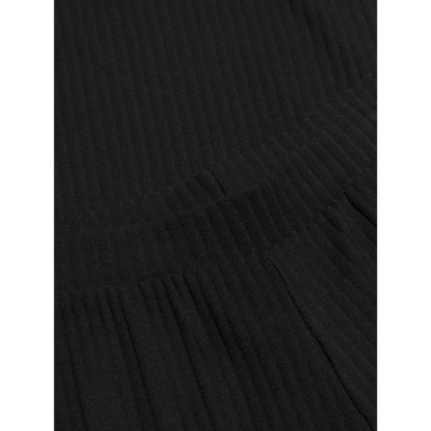 Gros plan du tissu noir côtelé du pantalon jambe large KOGNELLA PANT JRS NOOS de KIDS ONLY