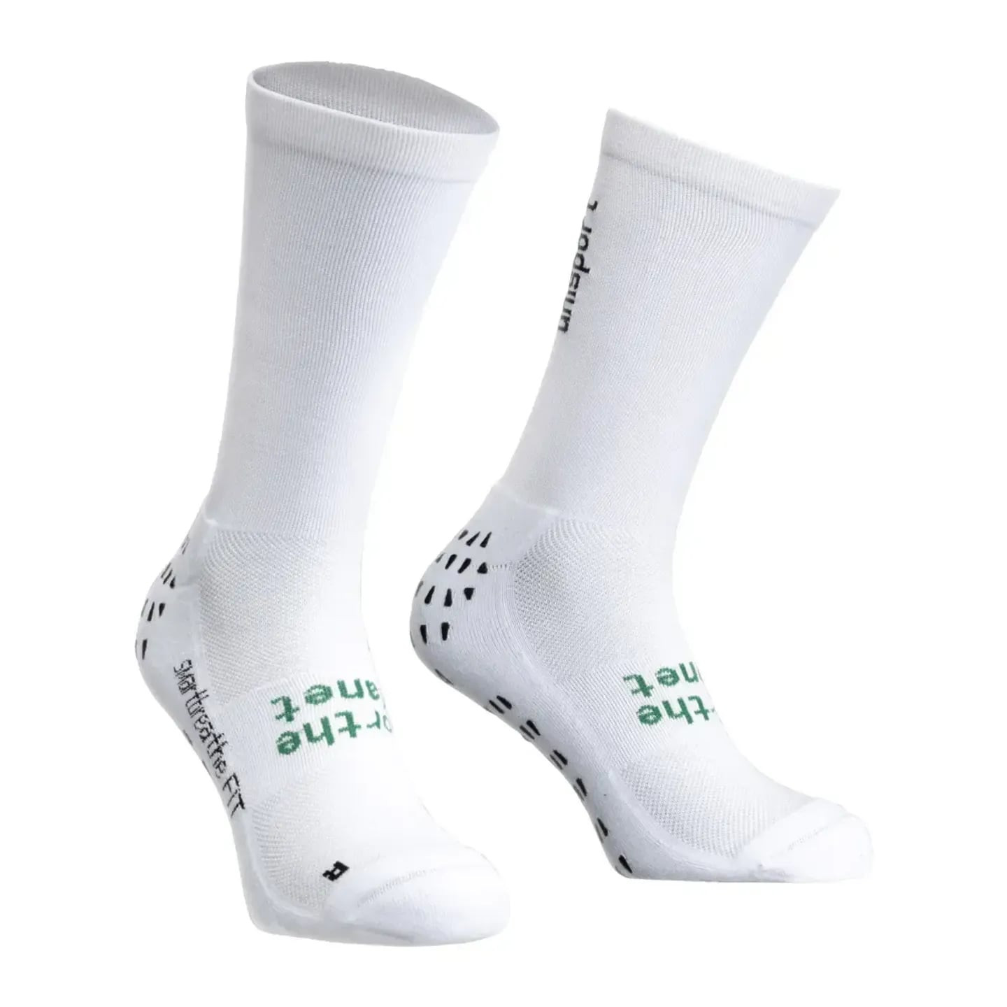 Chaussettes UHLSPORT GRIP blanches, vue inclinée montrant zones antidérapantes noires sous la semell