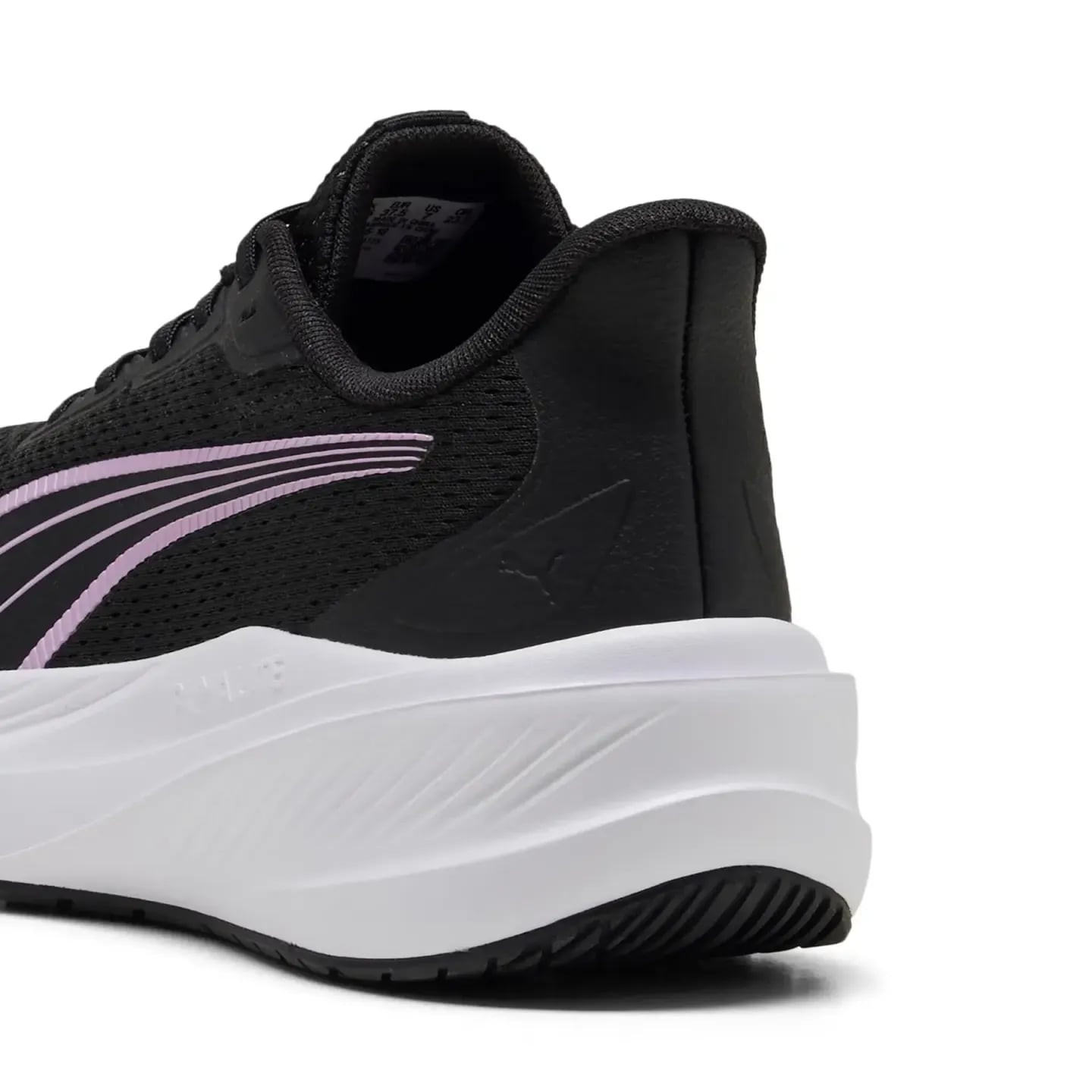 Détail arrière de la PUMA Dasher Lite : col rembourré, tige noire et semelle intermédiaire blanche e