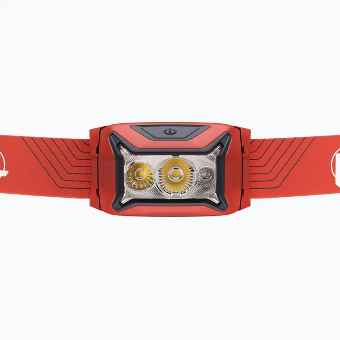 Gros plan de la lentille frontale Petzl Actik avec trois LED et boîtier rouge, optique à faisceau mi
