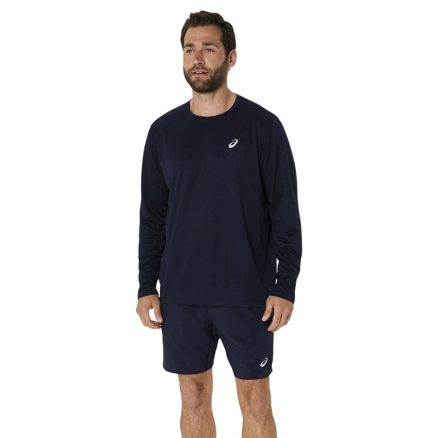 Coureur portant Asics Haut À Manches Longues Technique Running Core Ls Top Homme en extérieur