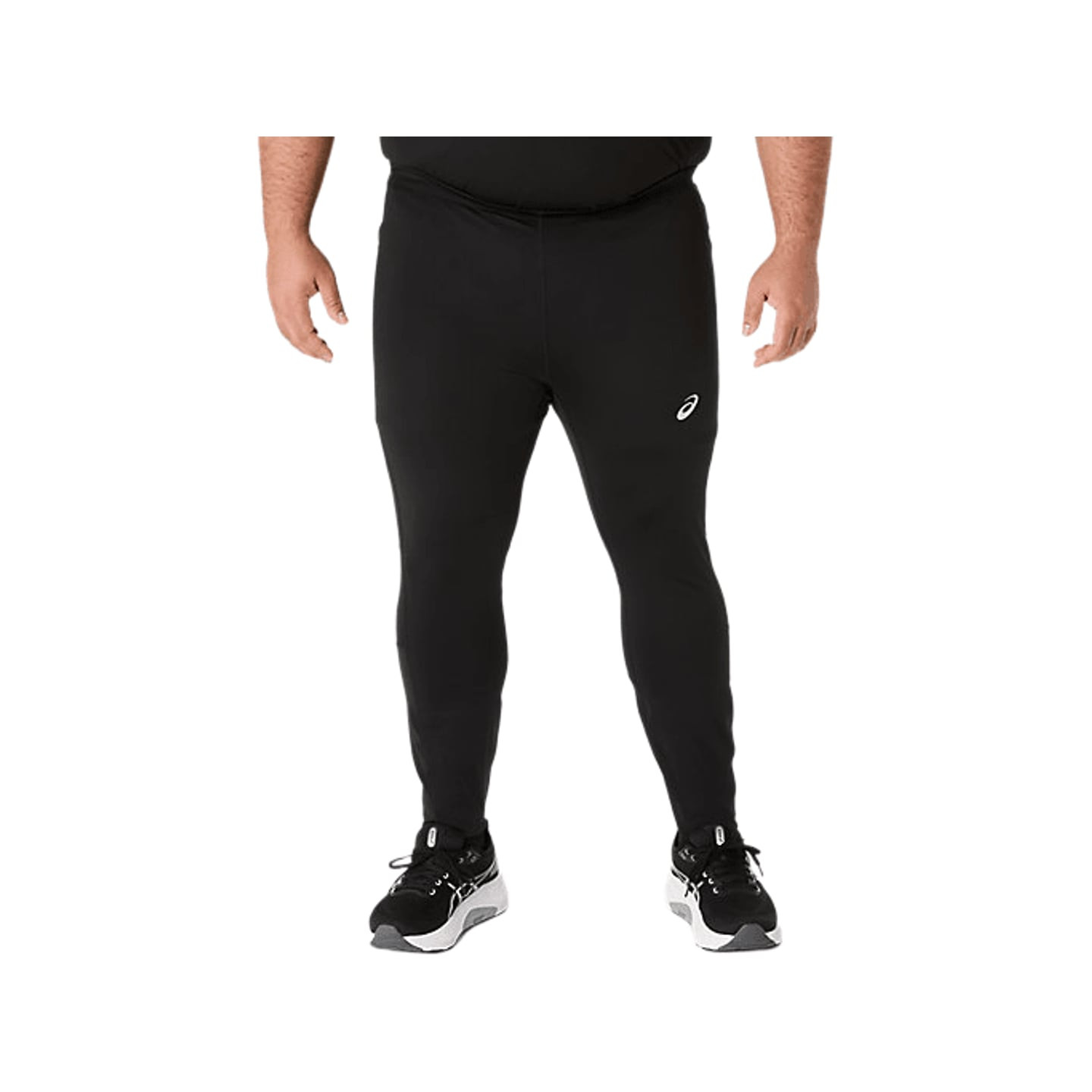 Vue de face du collant de course noir ASICS Core Tight pour homme porté avec des baskets ASICS noire