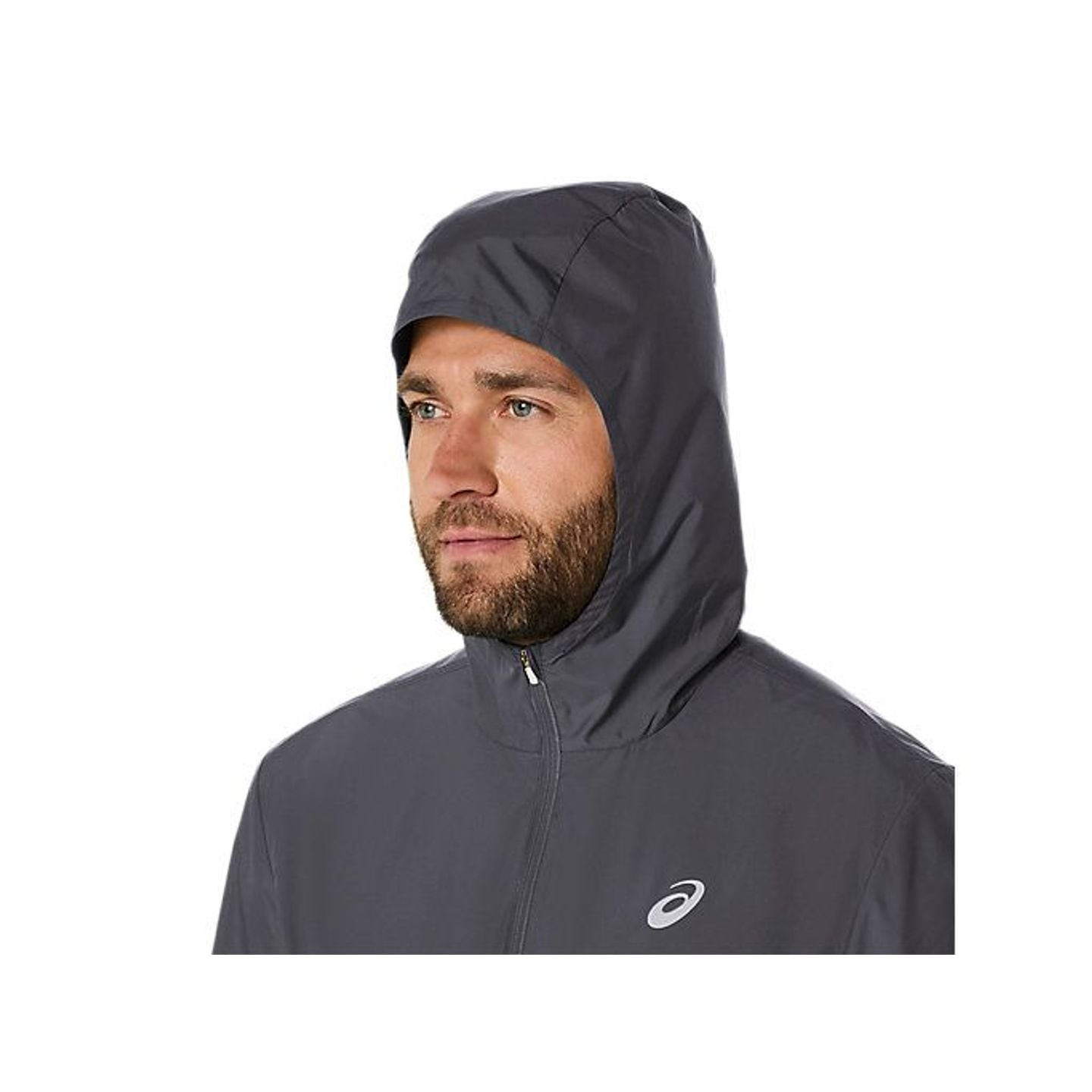 Asics Veste De Running À Capuche Core Coupe-Vent Déperlante Homme portée par un coureur en ville.