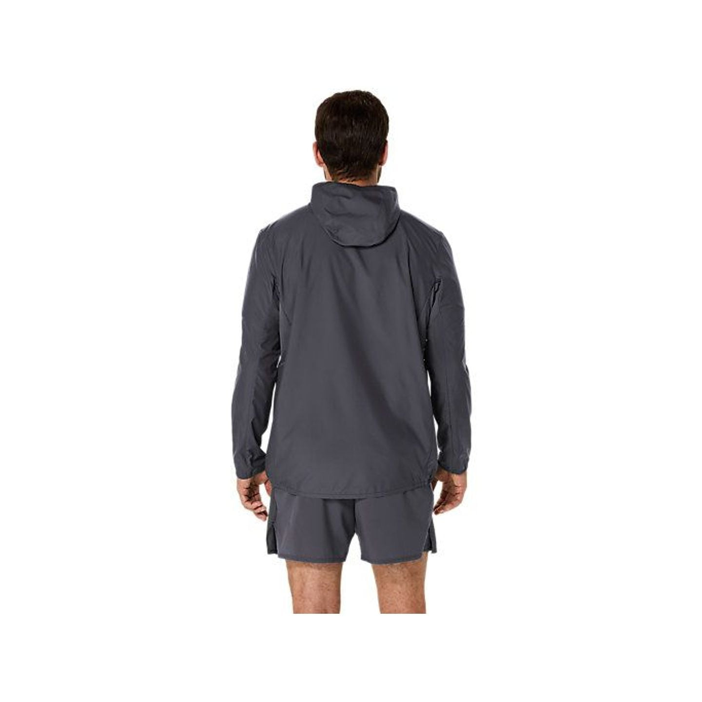 Asics Veste De Running À Capuche Core Coupe-Vent Déperlante Homme portée par un coureur urbain
