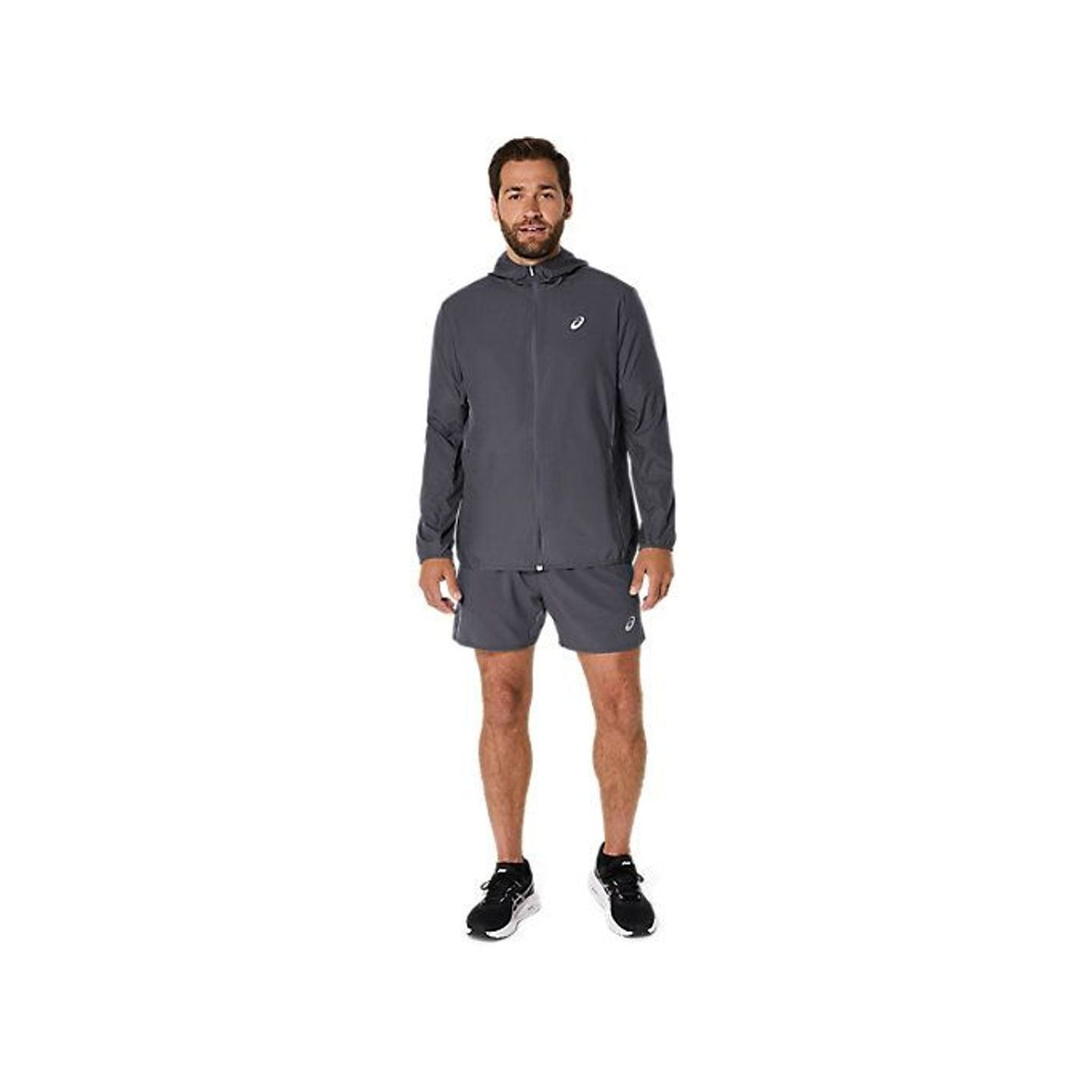 Asics Veste De Running À Capuche Core Coupe-Vent Déperlante Homme portée en running urbain.